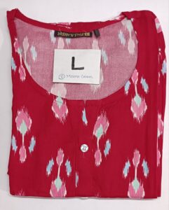 Red rayon kurti with multicolor printed motifs, round neckline, buttoned placket, and 3/4th sleeves.