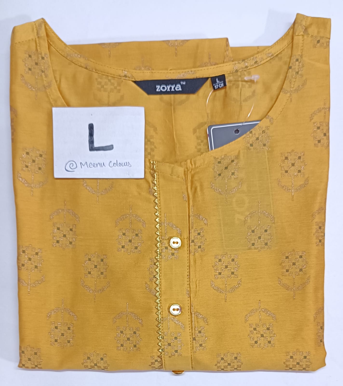Mustard yellow Chanderi cotton kurti with golden floral threadwork, round neckline, lace trim, and 3/4th sleeves.